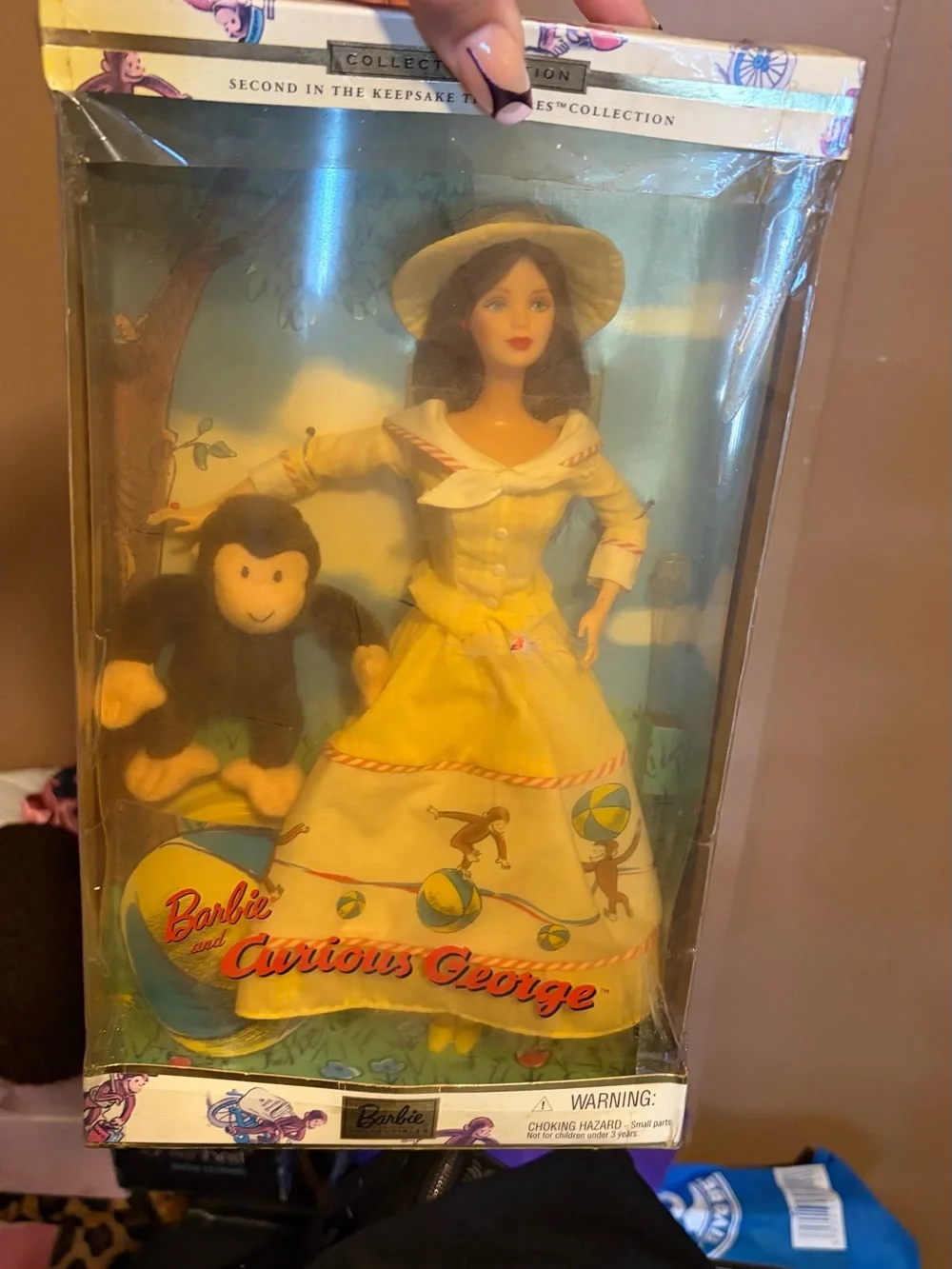 Barbie Collector Edition with Bright Yellow Packaging and Red Accents